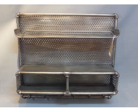 An industrial shelf unit, having two shelves above six coat hooks, H. 74cm