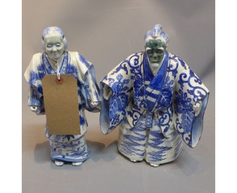 Two contemporary Japanese ceramic blue and white masked figures in traditional dress