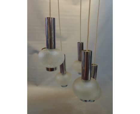 A 1970's chrome and frosted glass hanging ceiling light, with frosted globe shaped shades