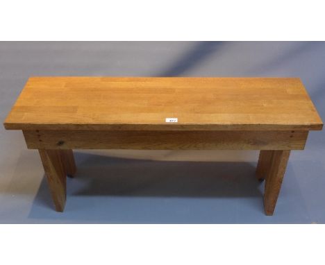 A 20th Century light oak bench.