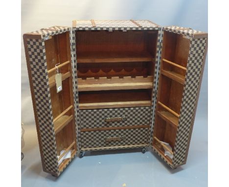 A Contemporary drinks cabinet in the form of a steamer trunk