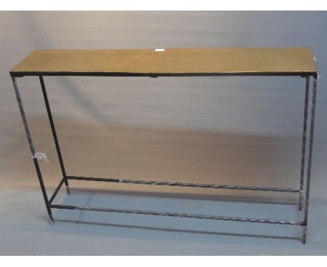 A contemporary bronzed top console table raised on steel legs, H:80cm W:119cm D:25cm