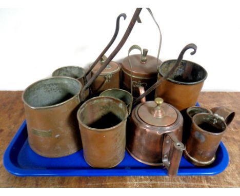 A tray containing antique and later copper wares to include cider and milk jugs, copper teapot, lidded Queen Elizabeth caddy 