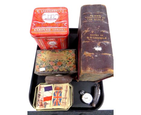 A tray containing miscellaneous to include vintage tins, flags of the world cards, leather cased tape measure, chrome cased p
