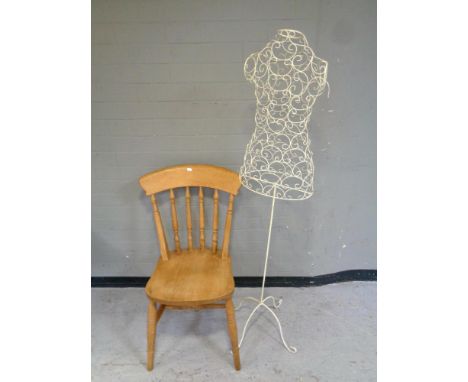A pine kitchen chair together with a wire metal mannequin on stand  