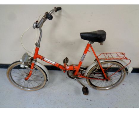A vintage lady's Universal folding bike 