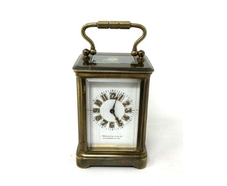 A miniature French brass cased carriage clock by Richard and Co, retailed by Bright and Sons Ltd of Scarborough, with key, he