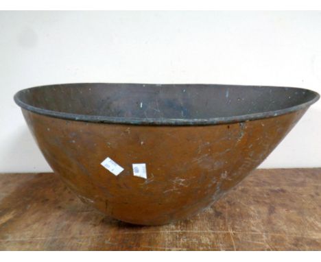 A 19th century over sized scale pan, length 57.5 cm 