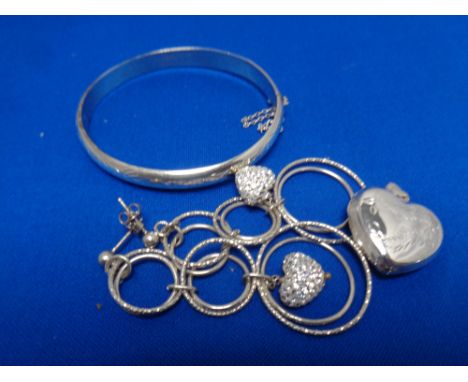 A silver heart pendant on chain together with bangle, earrings etc  