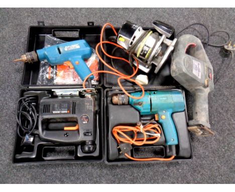 A crate of power tools to include Stanley router, Performance multi saw, Black &amp; Decker hand drills, Black &amp; Decker j