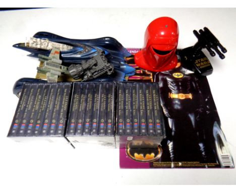 Harper Collins Lord of the Rings sealed cassette tapes, Star Wars toys, and vintage 1990 Batman calendar and large Batmobile 