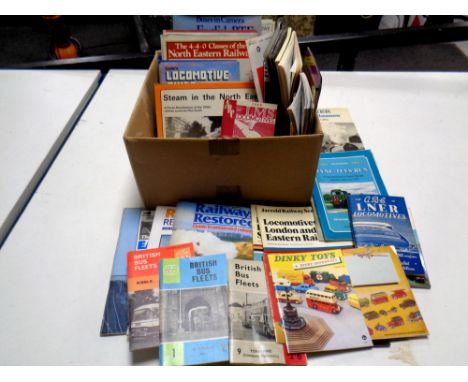 A box containing vintage books relating to trains, railways, buses etc 