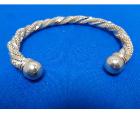 A decorative textured bangle  