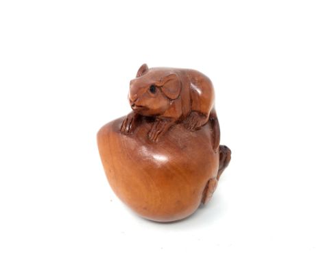 A Chinese carved hardwood netsuke - rat on pumpkin 