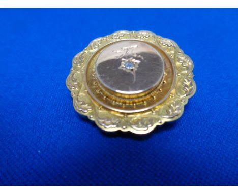 A vintage 9ct gold diamond set brooch  