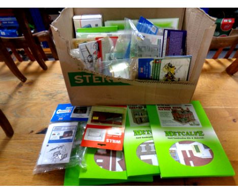 A box containing a quantity of railway 00/HO scale model buildings, construction kits, figures etc 