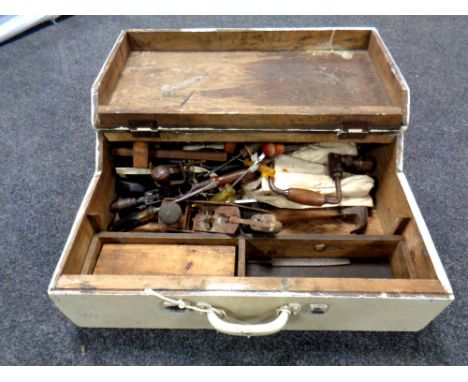 A vintage joiner's tool box containing hand tools, egg whisk drill, plane, brace, hammers etc 