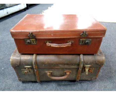 A vintage 20th century leather luggage case together with a bentwood bound trunk  