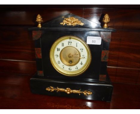 AN EDWARDIAN SLATE-CASED MANTEL CLOCK of architectural form