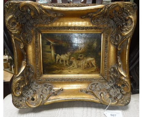 A VARNISHED PRINT OF DOGS in a gilt frame 