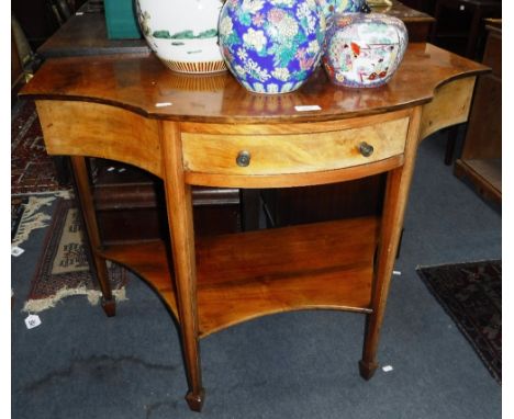 AN EDWARDIAN FIGURED WALNUT CONSOLE TABLE fitted a single drawer