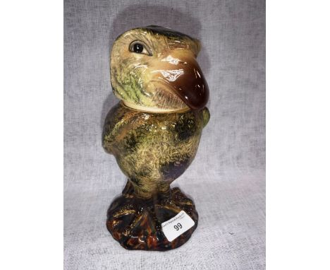 A CERAMIC BOX AND COVER in the form of a Martin Brothers grotesque bird