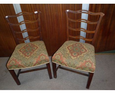 A PAIR OF GEORGE III MAHOGANY LADDER-BACK CHAIRS