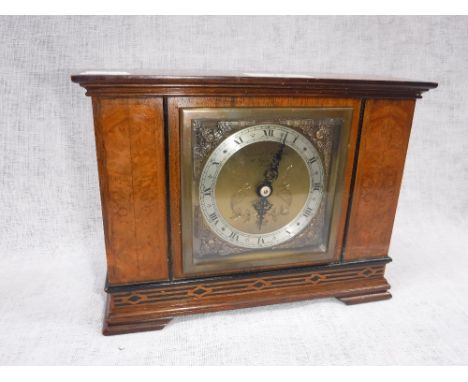 A 1950'S WALNUT CASED MANTEL CLOCK by Elliott, retailed by Garrard & Co Ltd, Regent Street, London
