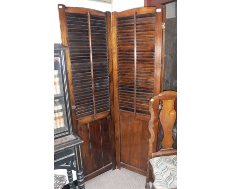A THREE-FOLD HARDWOOD SCREEN with louvered panels