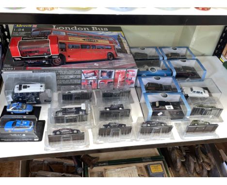 Collection of Diecast model vehicles including Revell London Bus, Carabinieri Police Cars, Oxford Automobile Company, etc.