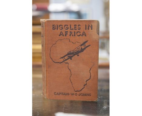 JOHNS, CAPT. W.E. 'Biggles in Africa'. First Edition. Published by The Oxford University Press. 1936. Pictorial red/brown clo