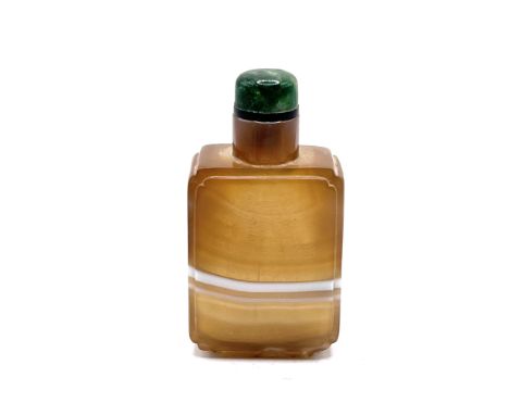 A 19thC banded agate Chinese snuff bottle Rectangular form with square shoulders and raised oval foot rim, having a white ban