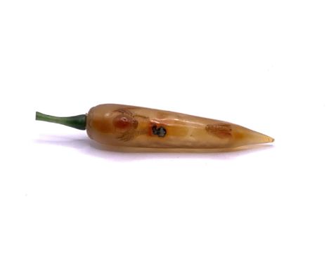 A polished agate snuff bottle in the form of a sweet pepper, with carved spider and fly decoration, the stopper in green jade