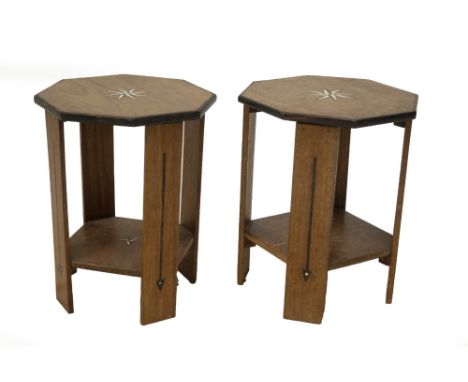 A pair of Arts and Crafts design and construction walnut jardiniere stands, of octagonal form, with ebony and ivory star inla