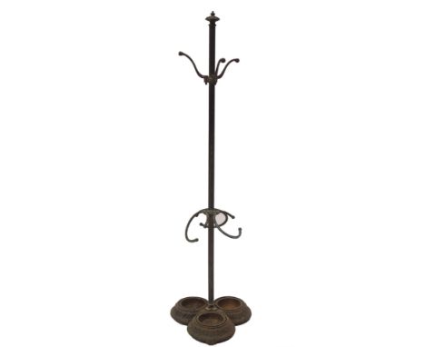 A Victorian brass and cast iron hat coat and stick stand, with reeded column, three hangers, and three torc reeded rings, to 