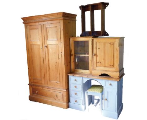 A 20thC stripped pine double wardrobe, 196cm H, 117cm W, 58cm D, and various associated pine bedroom furniture, painted dress