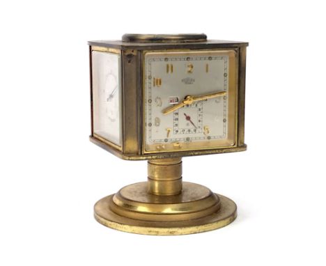ANGELUS DESK CLOCK COMPENDIUM, the rotating brass body with clock, thermometer, barometer, hydrometer and compass dials, on a