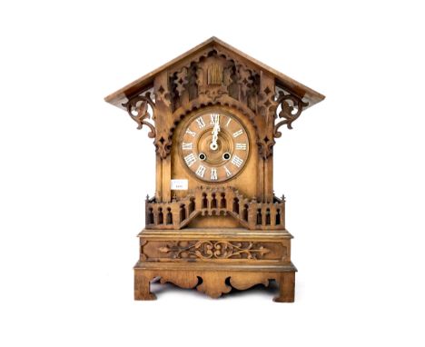 LATE 19TH CENTURY BLACK FOREST CUCKOO CLOCK, the two train eight day movement by G.H.S., the chapter ring with white Roman nu