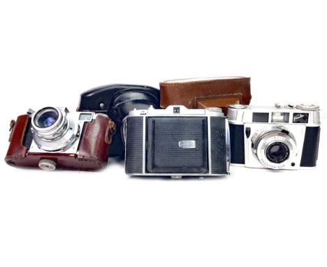 AGIFOLD BELLOWS ACTION FOLDING CAMERA, along with Agilux Anastigmat f/4.5 9cm lens, with leather covered case, also including