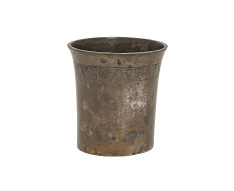 A silver medallic beaker, German or Eastern European, late 17th c, of flared shape with engraved border, the base inset with 