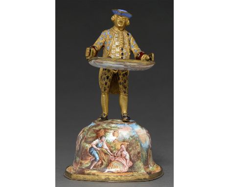 A Viennese giltmetal and painted enamel figure of a man carrying a tray, c1900, the high domed base and tray painted with lov
