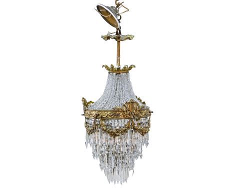 A French gilt lacquered brass and glass tent-and-bag chandelier, early 20th c, approximately 80cm h Requires cleaning but in 