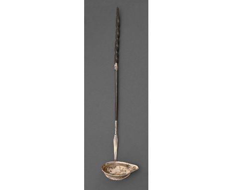 A silver punch ladle, with twisted baleen handle Faults