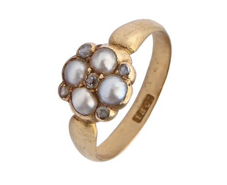 A split pearl ring with diamond accents, c1900, in gold marked 18ct, 3.2g, size K Good condition