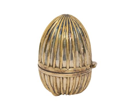 An Elizabeth II silver gilt 'surprise' egg,&nbsp;containing detachable lily brooch 'surprise' on green enamel base, 85mm h, b