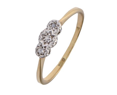 A diamond ring, illusion set in gold marked 18ct, 1.9g, size N Light wear