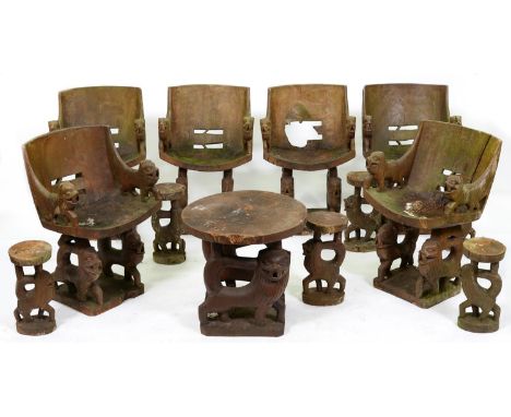 Tribal art. An unusual and distinctive suite of carved, dug-out hardwood garden furniture, second half 20th c, bucket shaped 