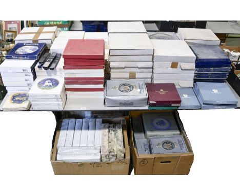 An extensive collection of picture plates by Wedgwood, Doulton, Goebel and others, all boxed 