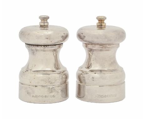 A pair of Elizabeth II silver table mills, 10cm h, by A J Poole, Birmingham 2001 Good second hand condition