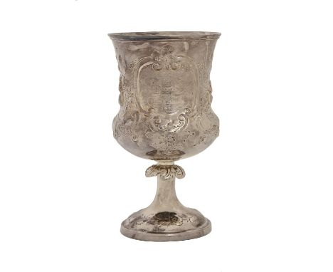 A Victorian silver goblet,&nbsp; chased with fruit and flowers and engraved with contemporary inscription dated 1860, 16.5cm 